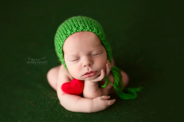 Pensacola, Florida newborn and family photographer, Shelley Barrett Photography takes adorable photos of a sweet baby girl in her Pace, Florida photography studio.