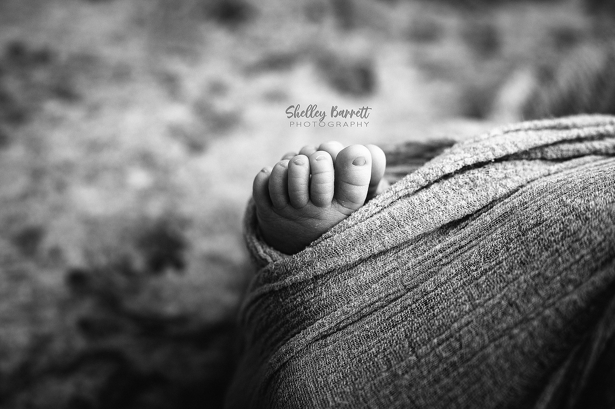 Close-up of newborn baby feet captured by a professional newborn photographer in Birmingham AL