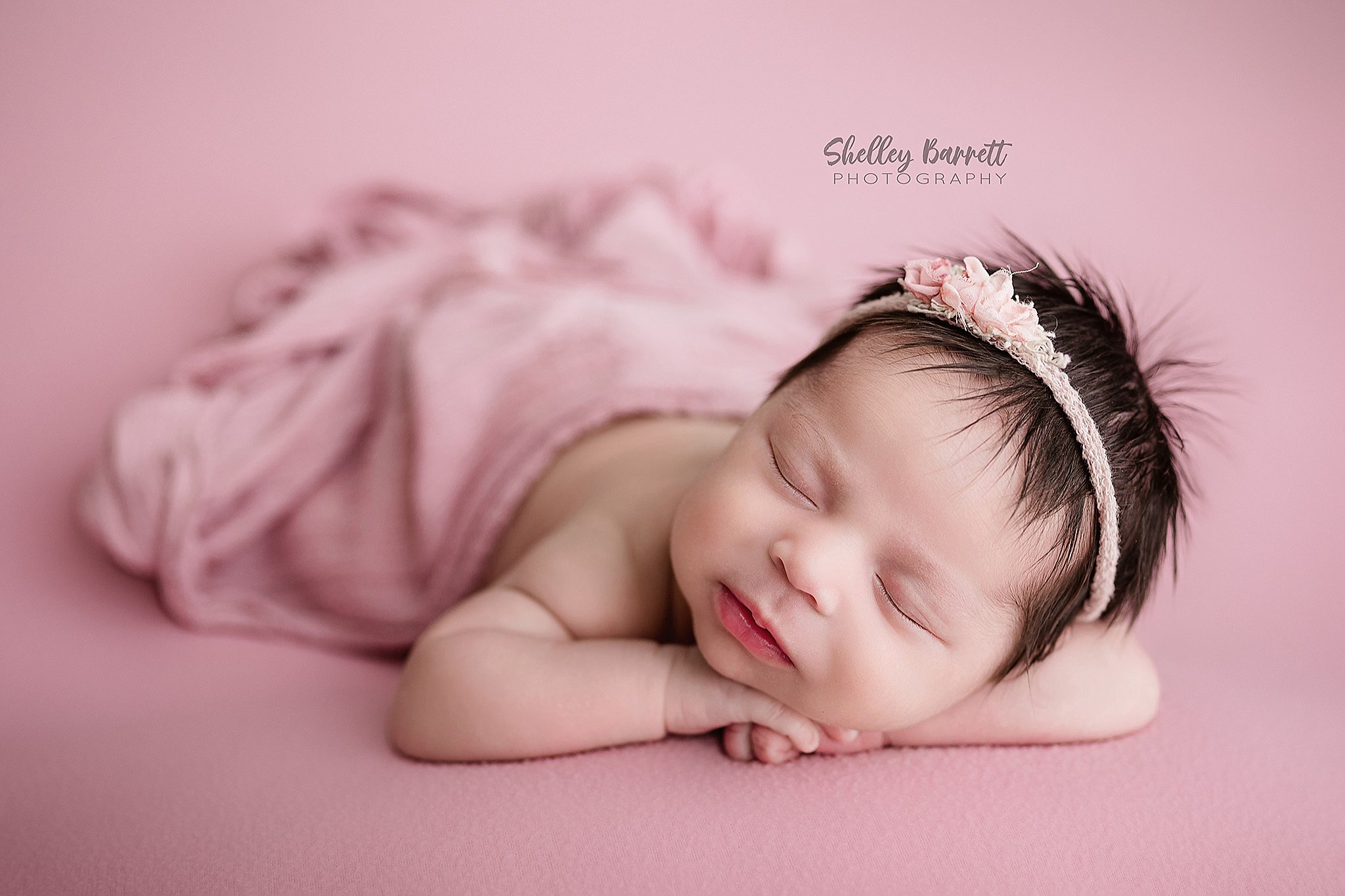 Sleeping newborn photographed by a Birmingham newborn photographer in Springville, Alabama