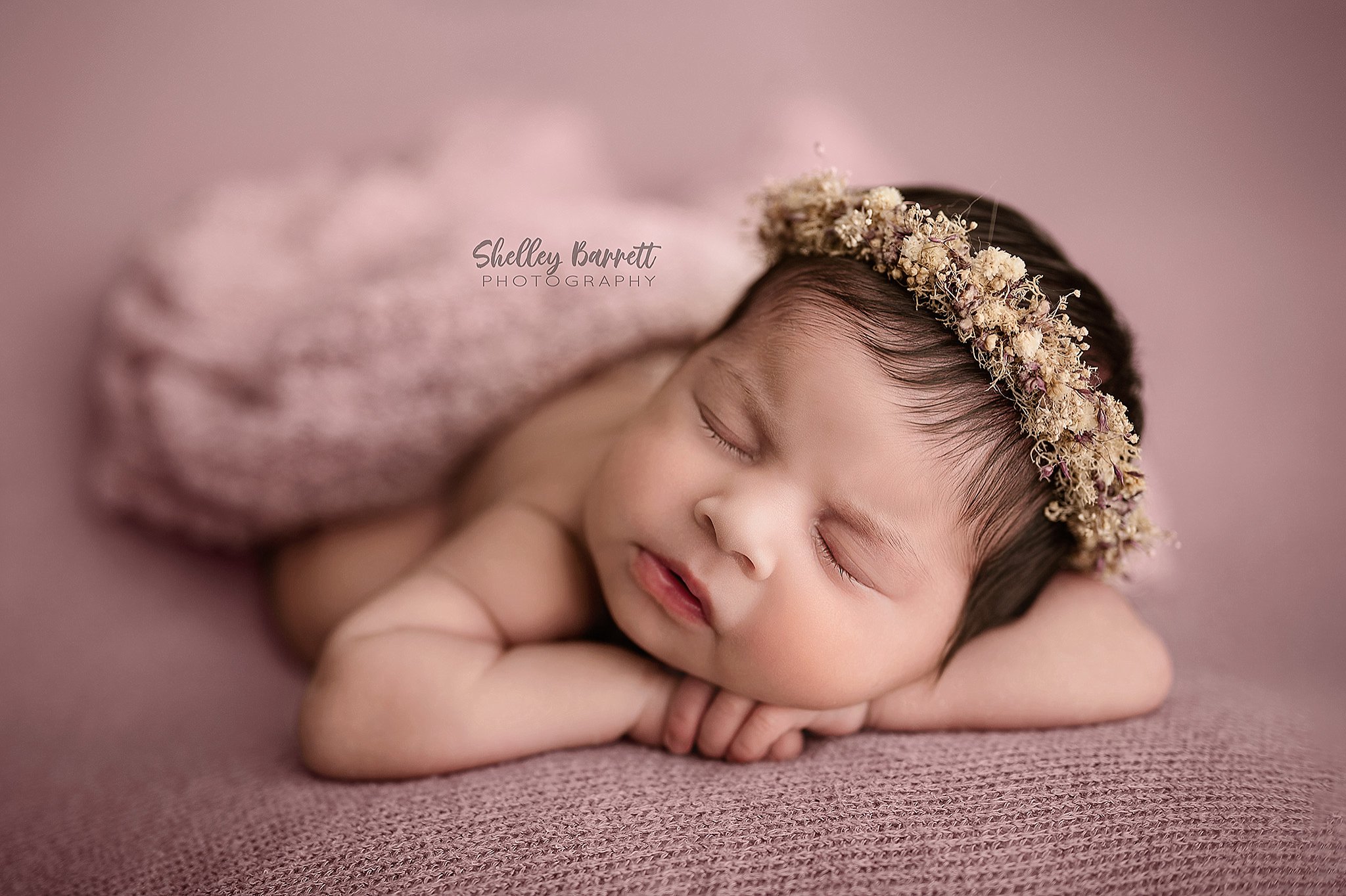 Sleeping newborn photographed by a Springville newborn photographer in Trussville, Alabama