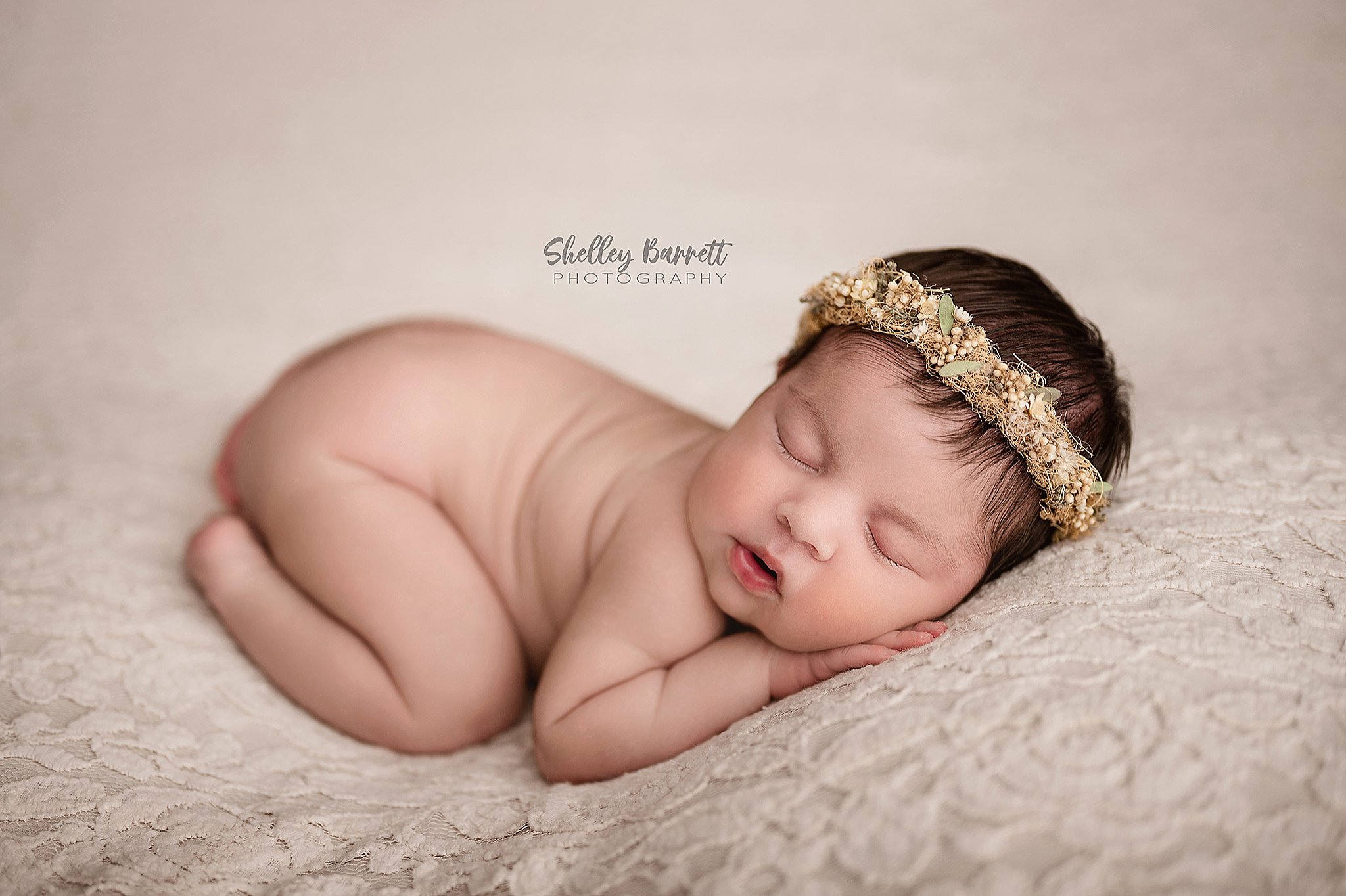 Sleeping newborn photographed by a Springville newborn photographer in Trussville, Alabama