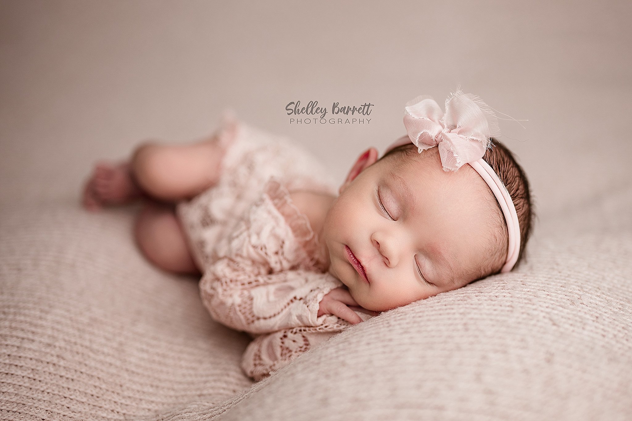 Newborn baby sleeping during a Birmingham newborn photography session